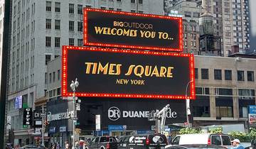Times Square signage with colorful advertisements.