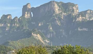 Dramatic mountain peaks with a hole in one.