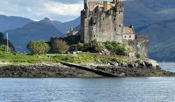 Eilean Donan Castle by a lake.