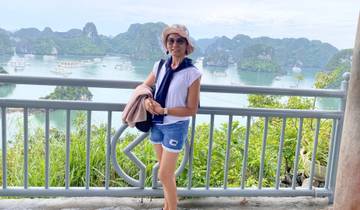 Woman posing in front of Halong Bay.