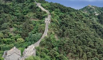 Great Wall of China stretching over mountains.