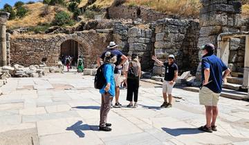 People exploring ancient ruins.