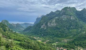 Mountain landscape with villages scattered at the base.