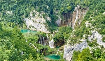 Stunning waterfalls and verdant landscape.