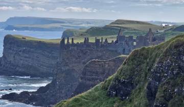 Ruin on a cliffside overlooking the sea.