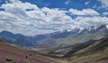 Panoramic view of mountains and a rocky path.