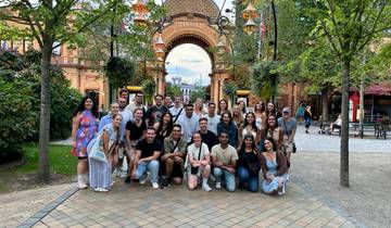 Large group at the entrance of Tivoli Gardens in Copenhagen.