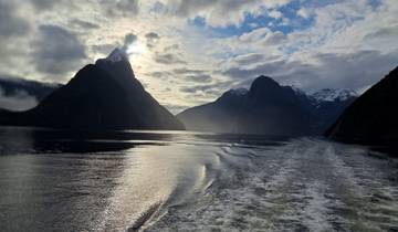 Milford Sound fjord with dramatic mountains in the background.