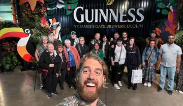 Group photo in front of 'Guinness Brewery' sign.