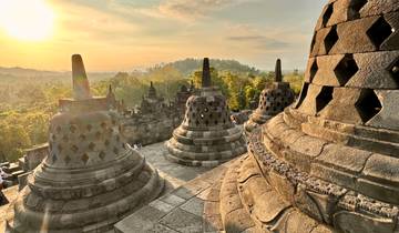 Ancient temple structures during sunrise.