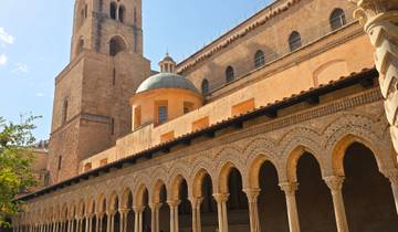 Historical building with arches and a dome.