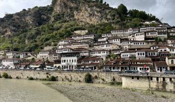 Traditional hillside village with stone houses.