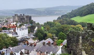 View of a historic castle with surrounding landscape.