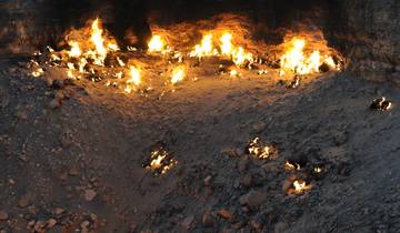 Darvaza gas crater with flames emerging from the ground