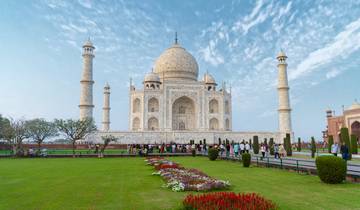 The Taj Mahal with visitors in the foreground.