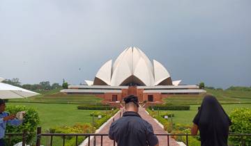 Lotus Temple in New Delhi with people in the foreground.