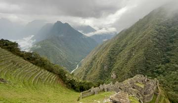 Panorama of mountainous landscape in cloudy weather.