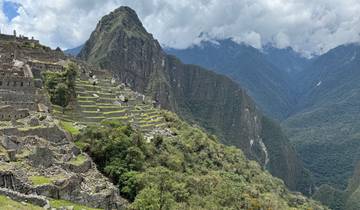 View of Machu Picchu and surrounding mountains.