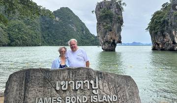 Two people posing at James Bond Island.