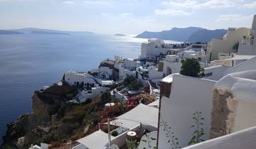 Scenic coastal view of white buildings by the sea