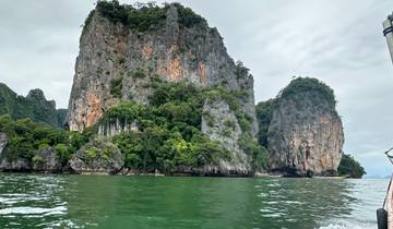 Dramatic rocky cliffs rising from the sea.