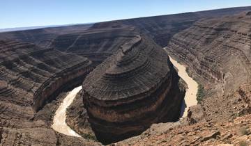 Aerial view of a serpentine canyon river.