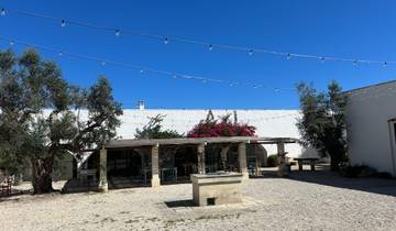 Sailboats at sunset over a calm sea in Boracay.