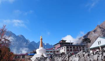 Monastery with mountains in the background.