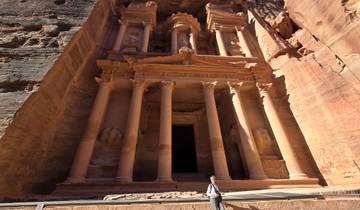 Tourist standing in front of Petra's Al-Khazneh