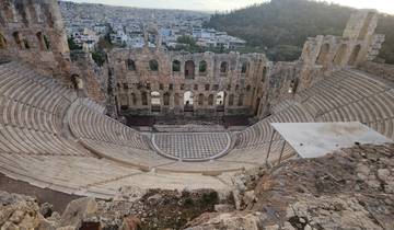 View of Herodion Theatre with city in background.