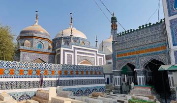 Historic mosque with blue and white tile work.