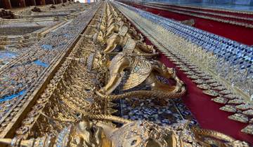Ornate temple wall with gold details.