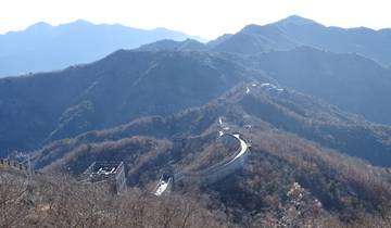 Aerial view of the Great Wall of China on a mountain range.