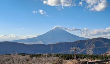 Mount Fuji in the distance with a clear blue sky.
