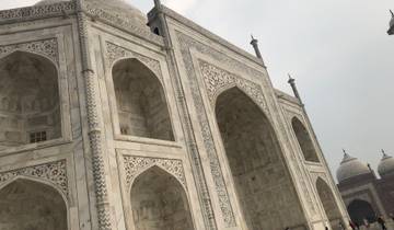 Close-up of the Taj Mahal's intricate marble facade.