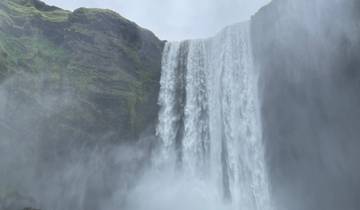 Massive waterfall cascading over cliffs.