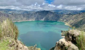 A scenic view of a large crater lake.