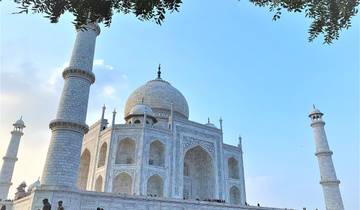 Taj Mahal under a clear blue sky.