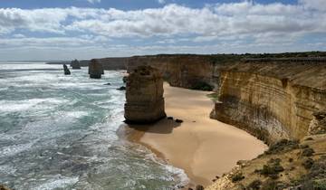 View of ocean cliffs and clear blue water.