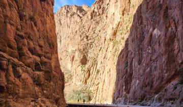 Tall gorge with sunlight streaming through.