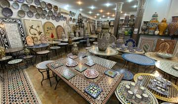 Inside a shop displaying traditional Moroccan ceramics and tiles.