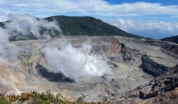 Volcano crater emitting steam.