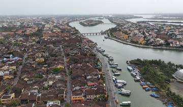Aerial view of a city with a river running through it.