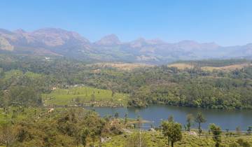 Lake view with mountains and lush greenery