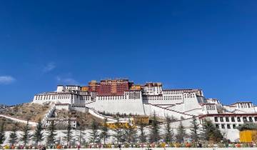 Potala Palace under a clear blue sky.