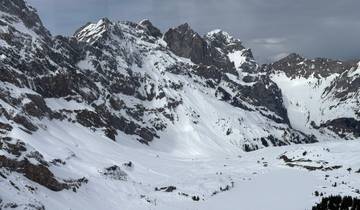 Imposing snowy mountains with jagged peaks.