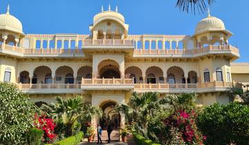 Impressive historical building with arches and domes.