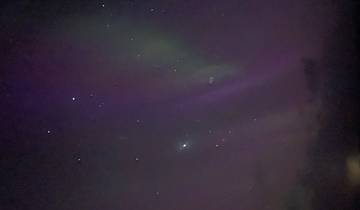 Colorful aurora borealis lighting up the night.