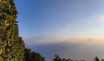 Distant snowy mountains under a blue sky.