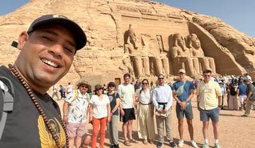 Group of tourists taking a selfie in front of the Abu Simbel temples.